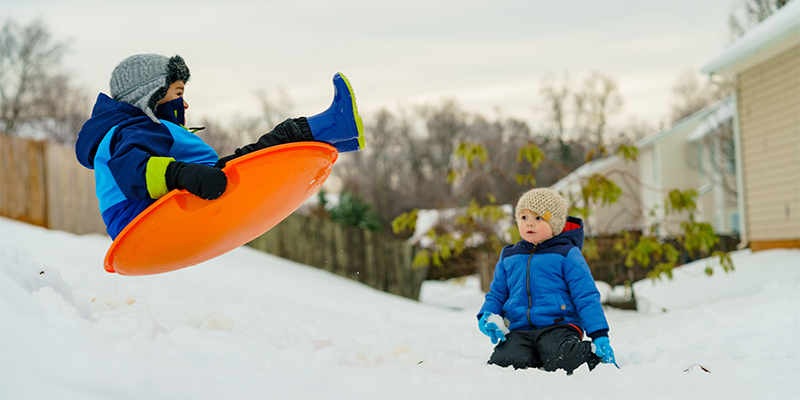 Winter gaming activities sledding